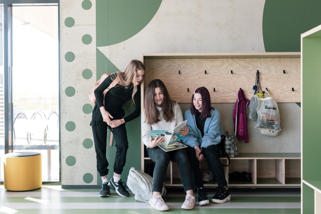 Girls are reading a book in school_Renee Altrov .jpg